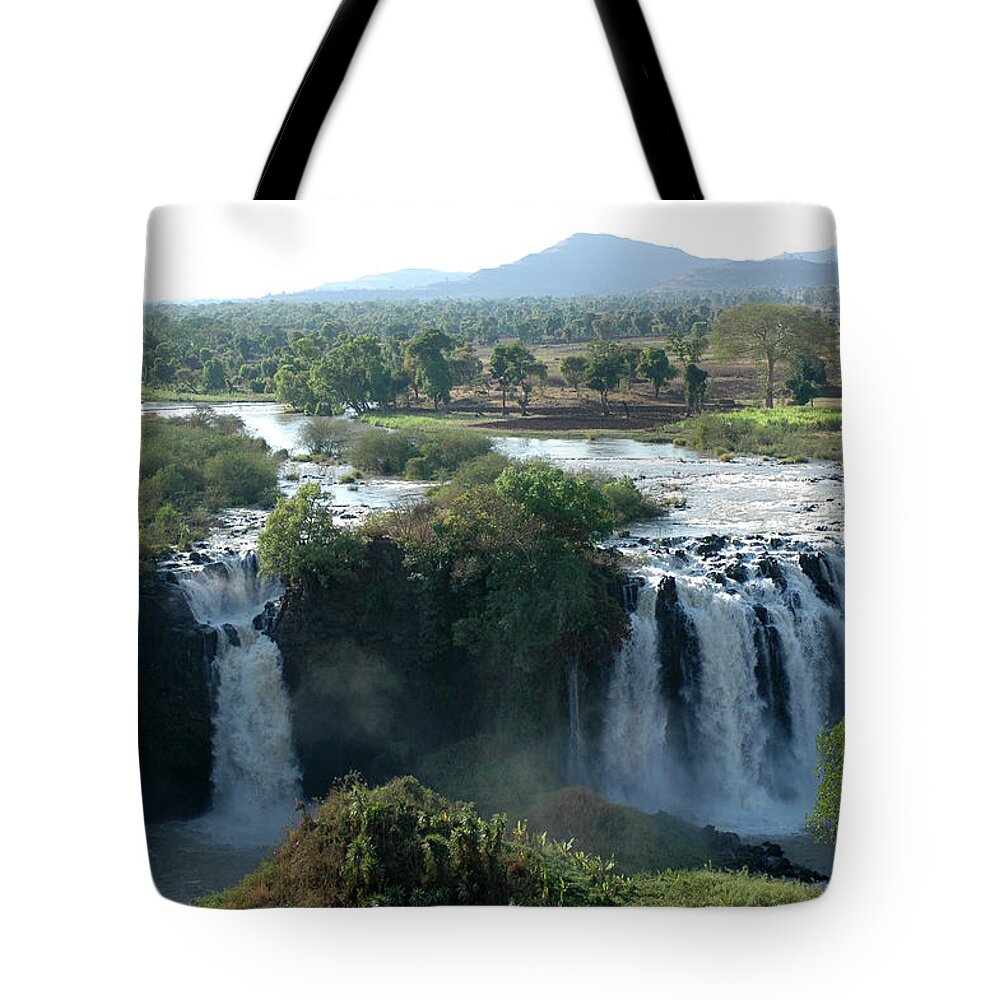 Blue Nile Tote Bag featuring the photograph Blue Nile Falls, Ethiopia #1 by Christophe cerisier