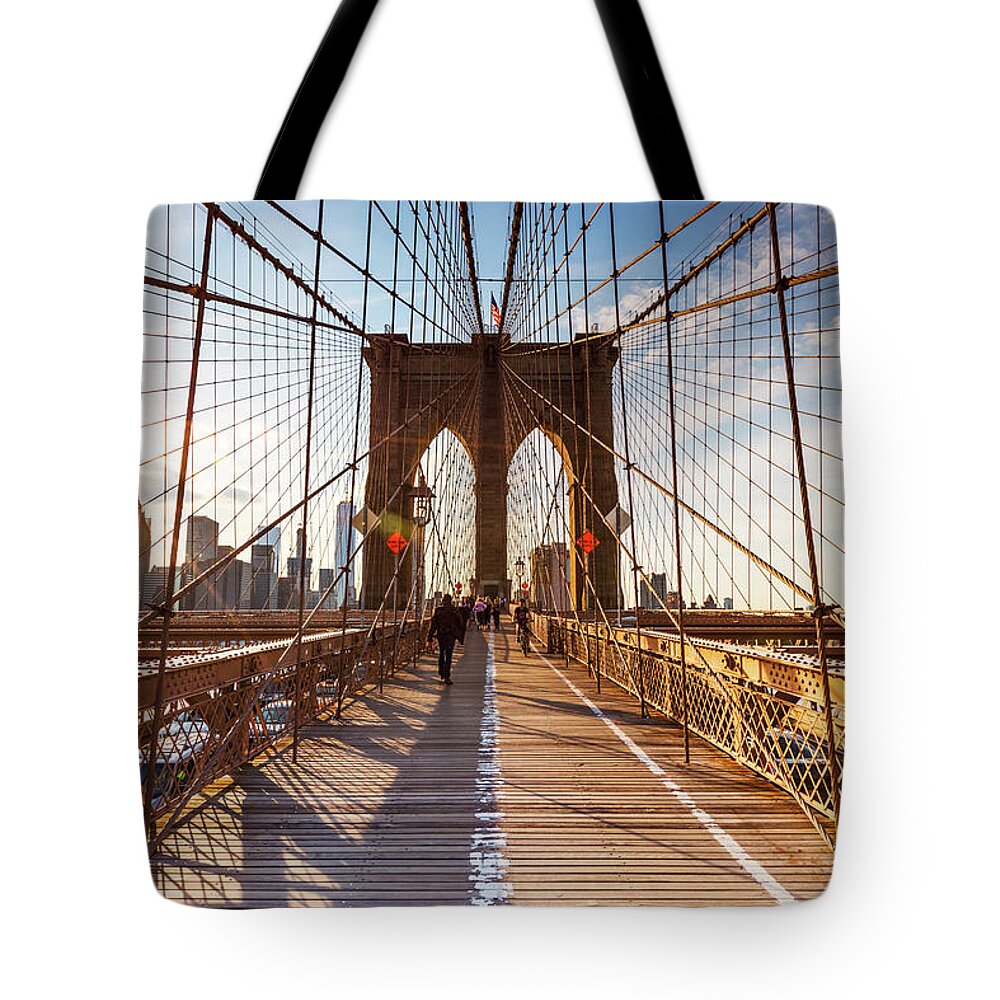 Brooklyn Bridge Tote Bag featuring the photograph Brooklyn bridge at sunset, New York, USA #1 by Matteo Colombo