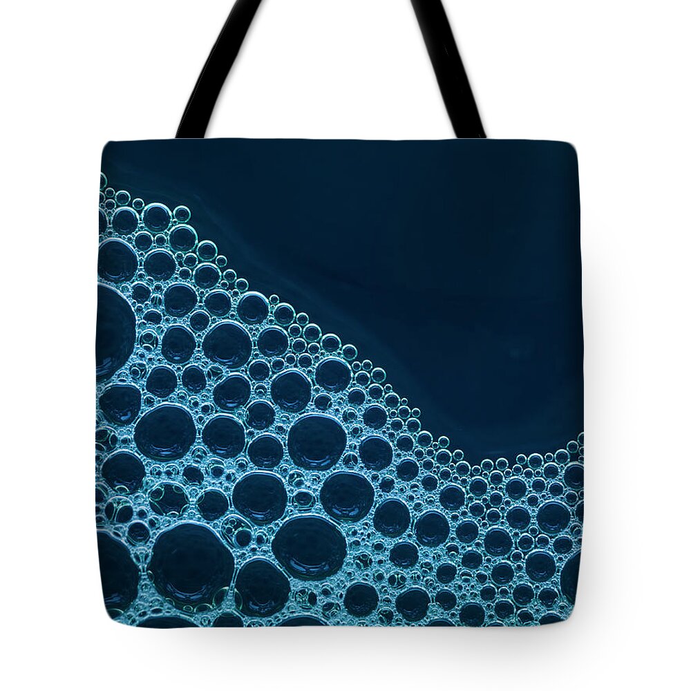Connection Tote Bag featuring the photograph Close Up Of Bubbles #1 by Henrik Sorensen