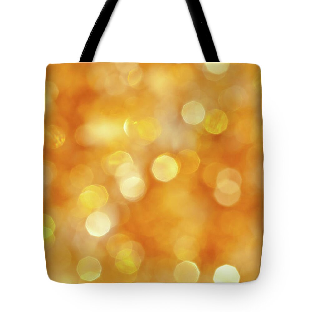 Particle Tote Bag featuring the photograph Defocused Lights #1 by Jasmina007