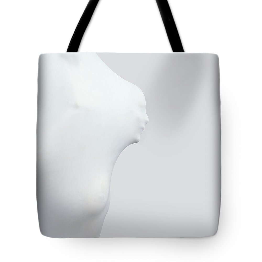 Figure Pushing Through Rubber Tote Bag by Mark Mawson 
