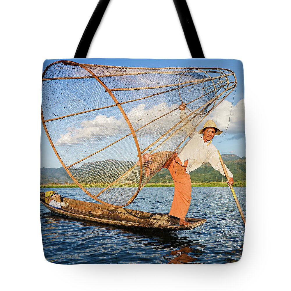 Young Men Tote Bag featuring the photograph Fisherman On Inle Lake, Myanmar #1 by Hadynyah