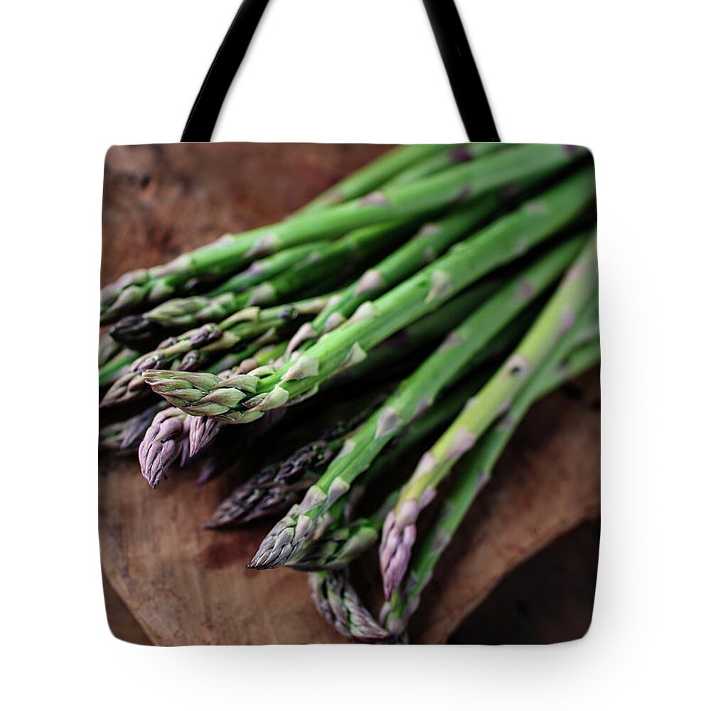 Asparagus Tote Bag featuring the photograph Fresh Green Asparagus by Nailia Schwarz