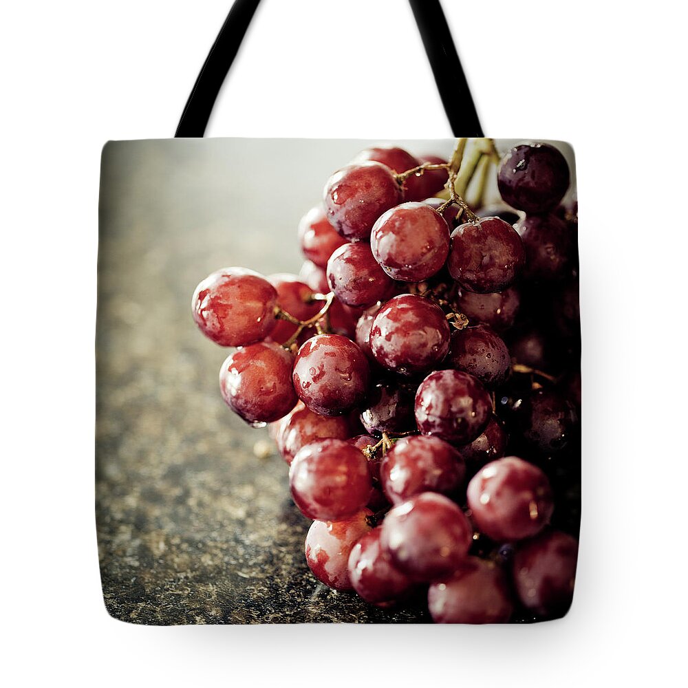 Purple Tote Bag featuring the photograph Grape #1 by Mmeemil