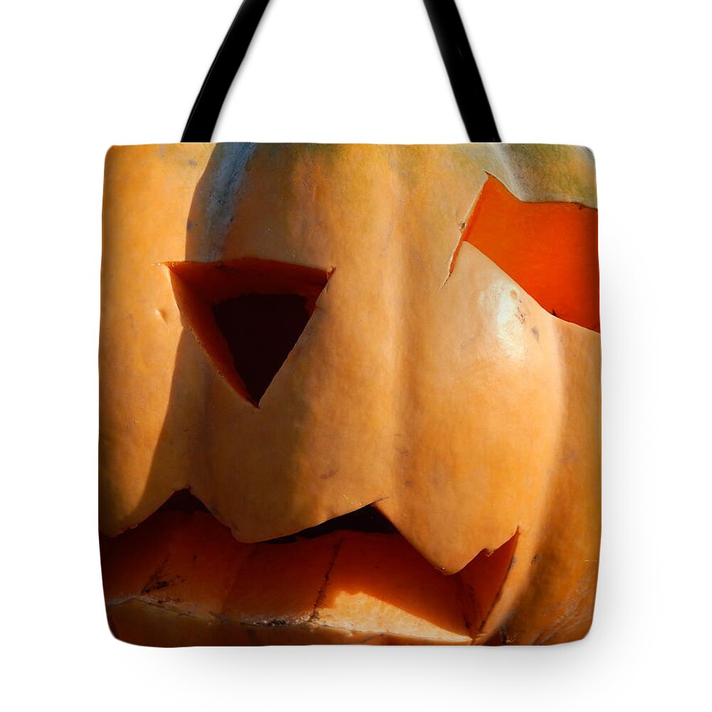 Thanksgiving Tote Bag featuring the photograph Halloween holiday day carved pumpkin #1 by Oleg Prokopenko