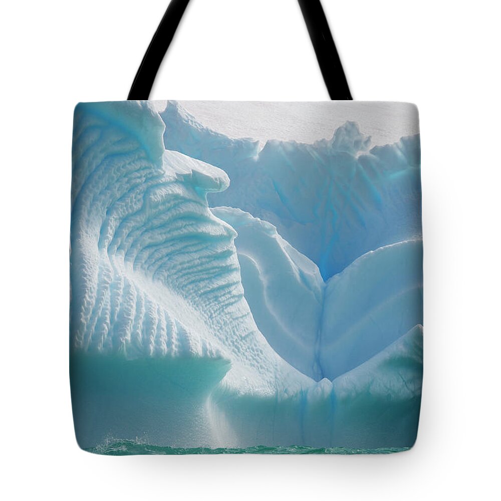 Melting Tote Bag featuring the photograph Iceberg Along The Antarctic Peninsula #1 by Mint Images - David Schultz