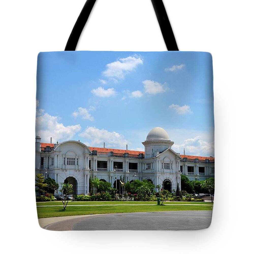Architecture Tote Bag featuring the photograph KTM railway colonial train station building with gardens Ipoh Malaysia #2 by Imran Ahmed