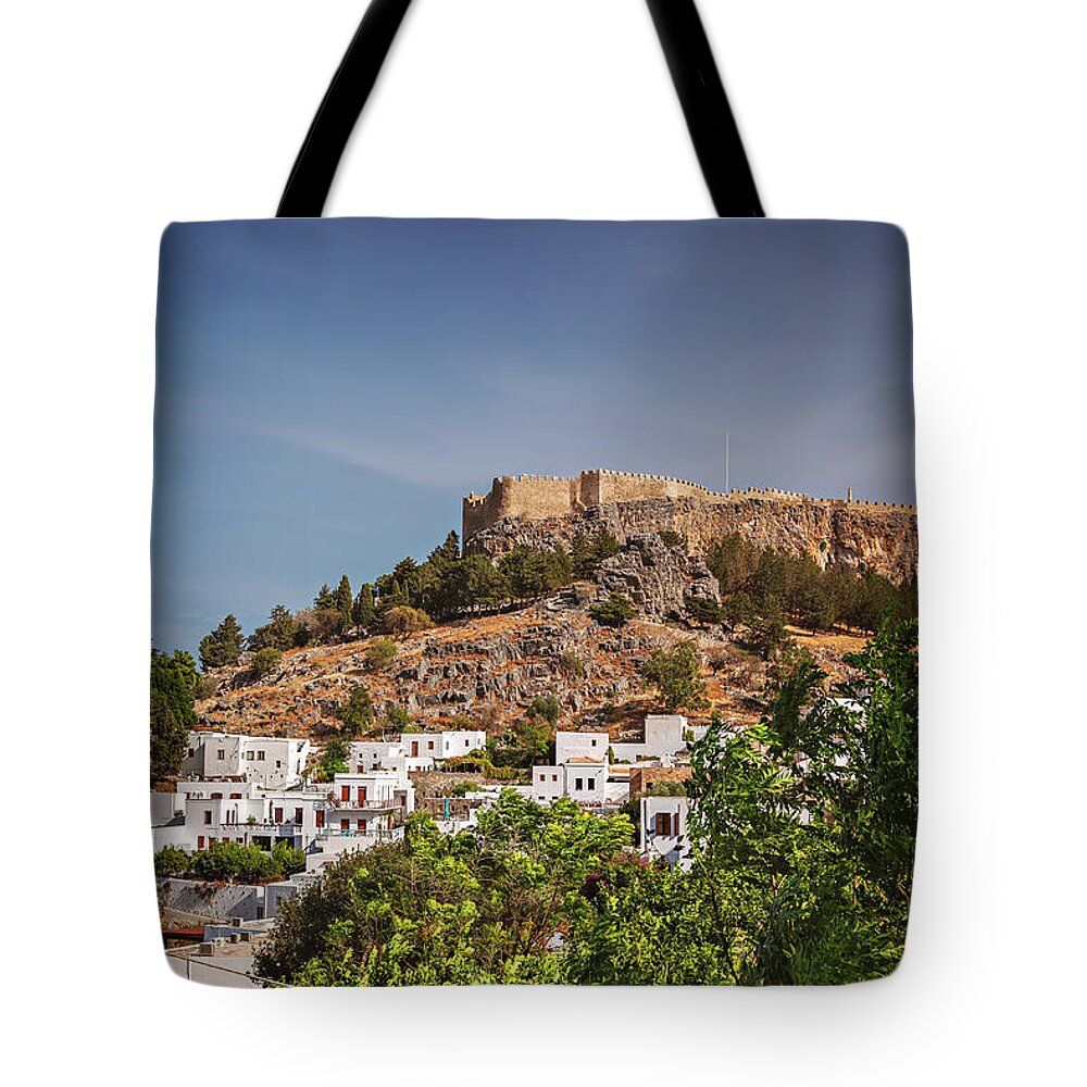 Hill Tote Bag featuring the photograph Lindos village Rhodes #1 by Sophie McAulay