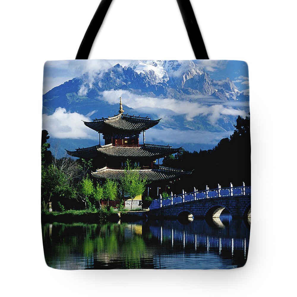 Pagoda Tote Bag featuring the photograph Pagoda Reflected In Black Dragon Pool #1 by Richard I'anson