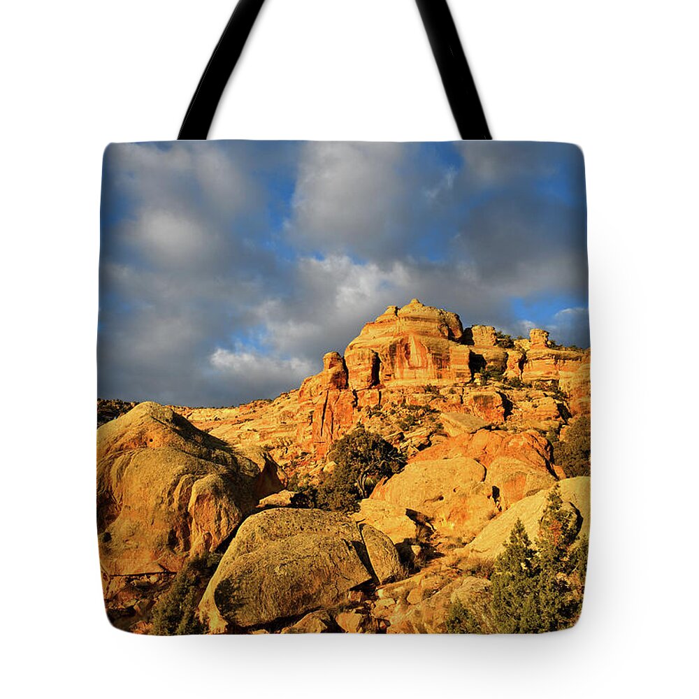 Colorado National Monument Tote Bag featuring the photograph Sunrise Clouds over Colorado National Monument #1 by Ray Mathis