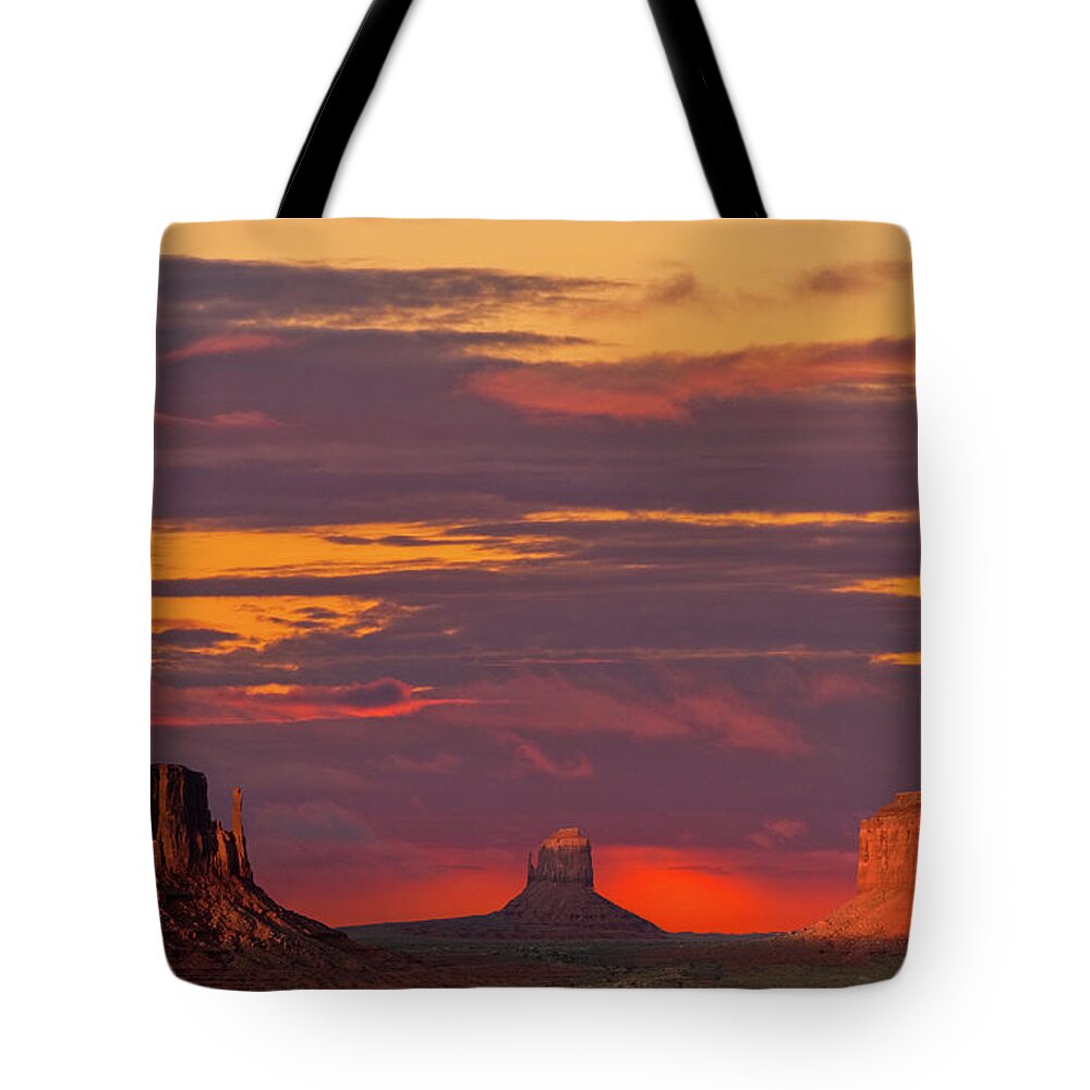Arid Climate Tote Bag featuring the photograph The Mittens and Merrick Butte at Sunset by Jeff Goulden