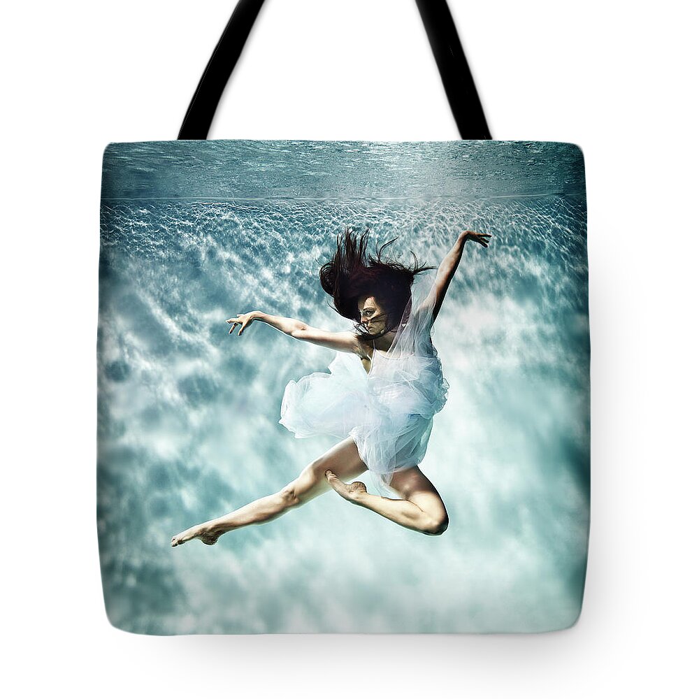 Ballet Dancer Tote Bag featuring the photograph Underwater Ballet by Henrik Sorensen