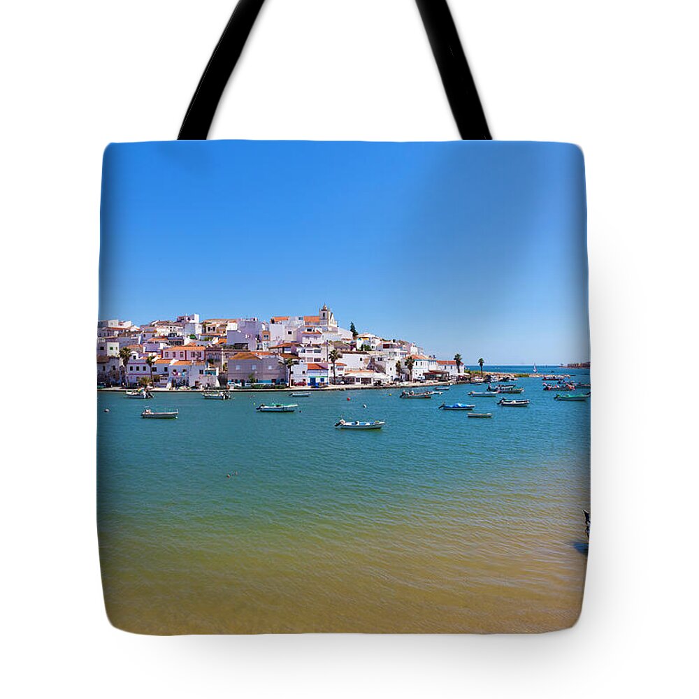 Algarve Tote Bag featuring the photograph View Of Ferragudo, Algarve, Portugal #1 by Werner Dieterich