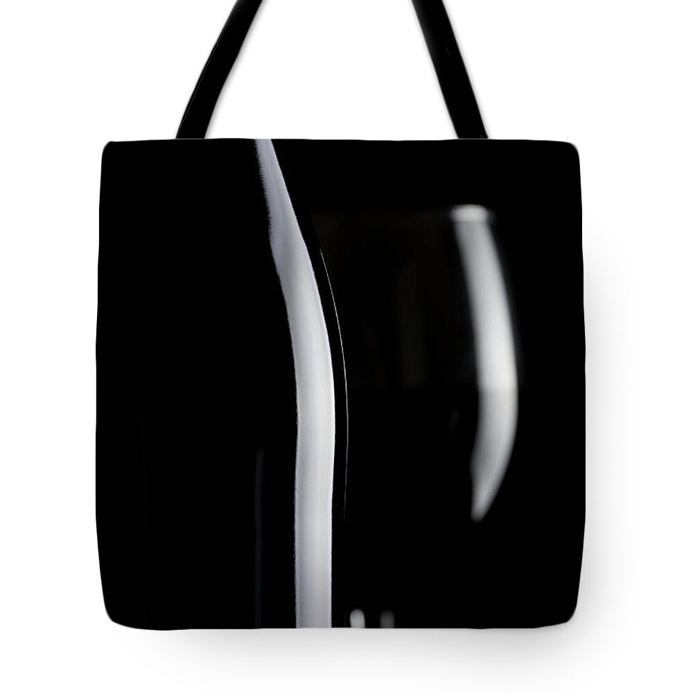 Alcohol Tote Bag featuring the photograph Wine Bottle #1 by Republica