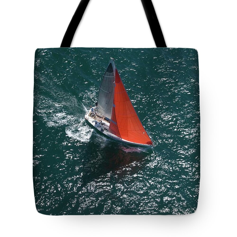 Wake Tote Bag featuring the photograph Yacht Competes In Team Sailing Event #1 by Moodboard