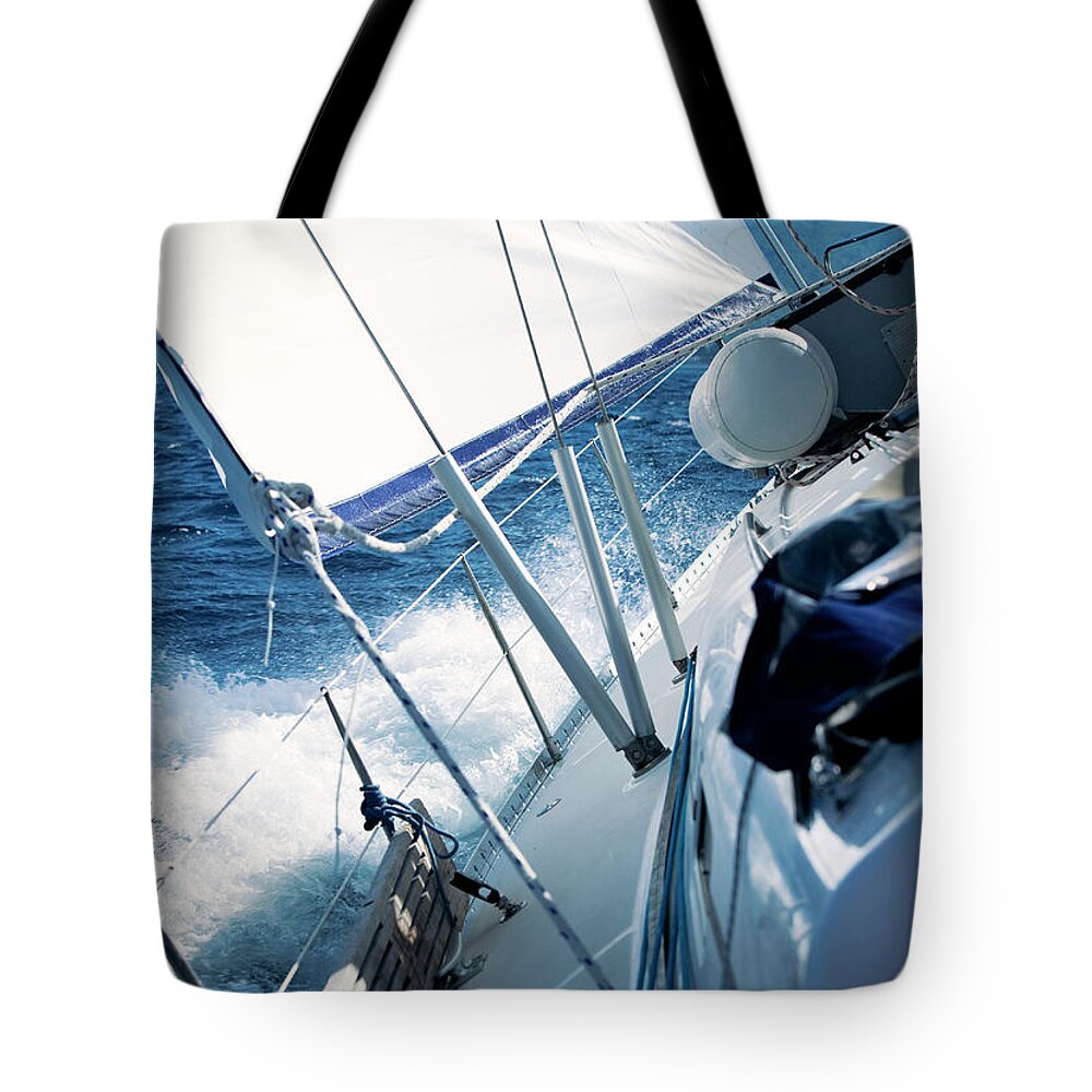 Curve Tote Bag featuring the photograph Sailing In The Wind With Sailboat #11 by Mbbirdy