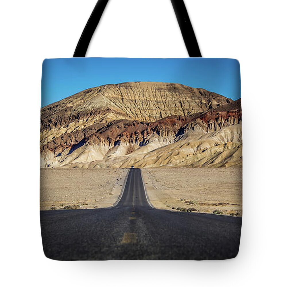 Road Tote Bag featuring the photograph Lonely Road In Death Valley National Park In California #12 by Alex Grichenko