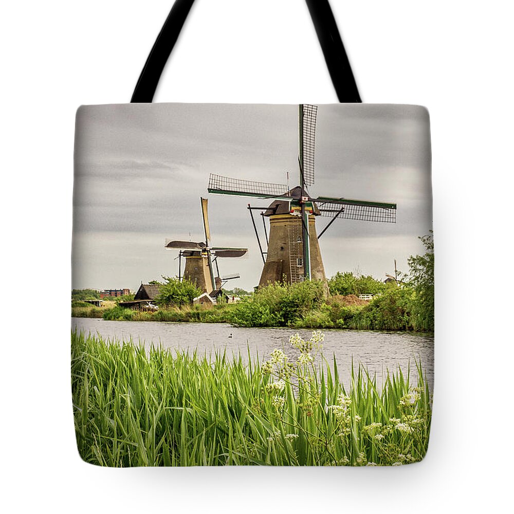 Kinderdijk Tote Bag featuring the photograph Kinderdijk Holland Windmills #2 by Donald Pash