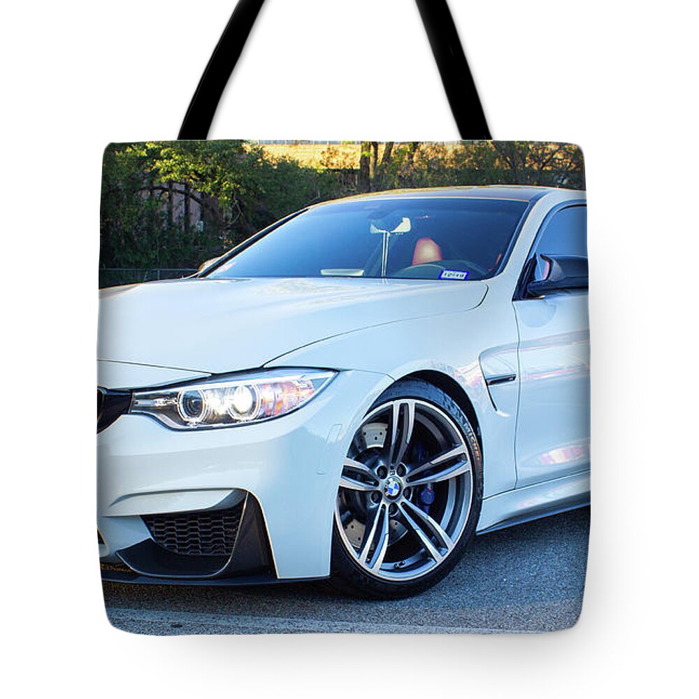 Bmw M4 Tote Bag featuring the photograph Bmw M4 by Rocco Silvestri