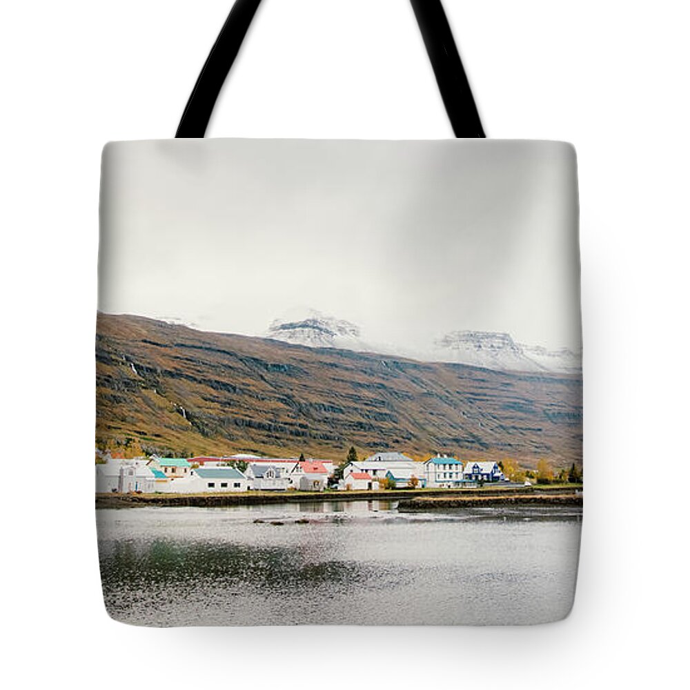 Aerial Tote Bag featuring the photograph Fishing village on the east coast of Iceland #3 by Joaquin Corbalan