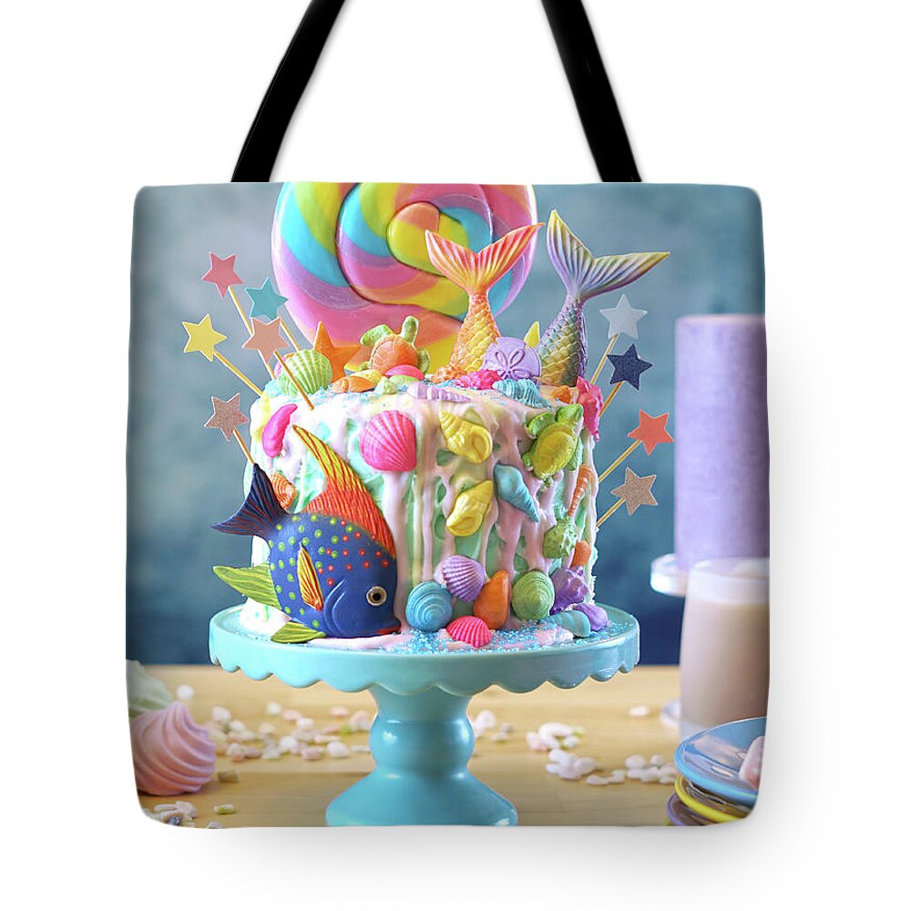 Mermaid Tote Bag featuring the photograph Mermaid theme candyland cake with glitter tails, shells and sea creatures. #3 by Milleflore Images