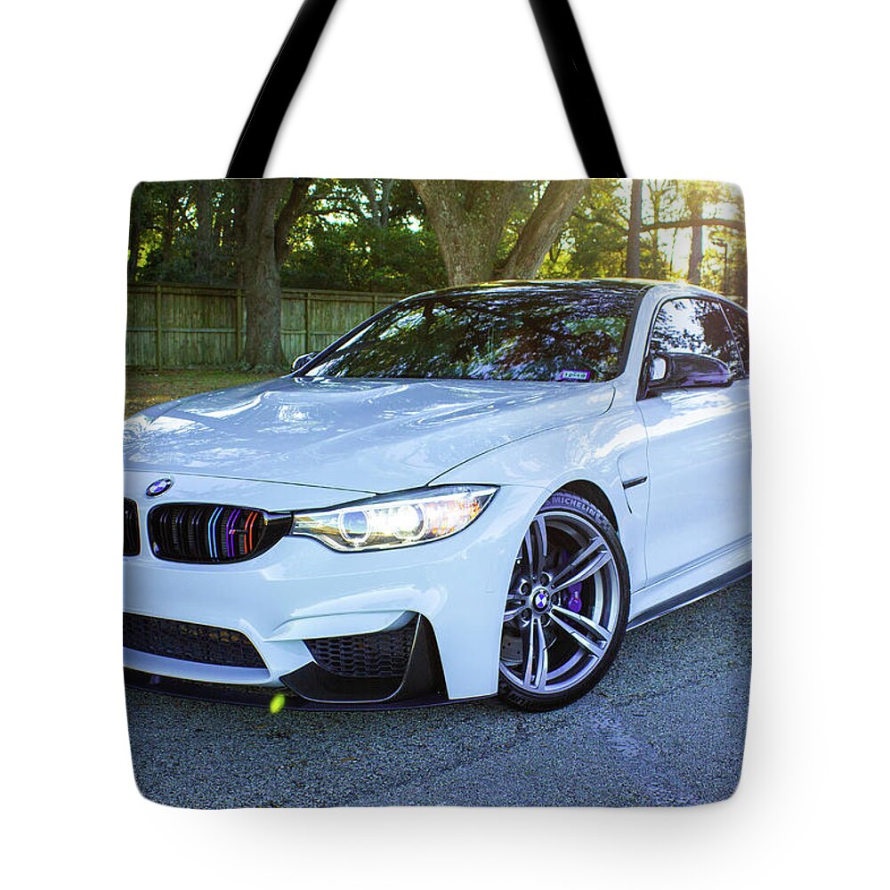 Bmw M4 Tote Bag featuring the photograph Bmw M4 #4 by Rocco Silvestri