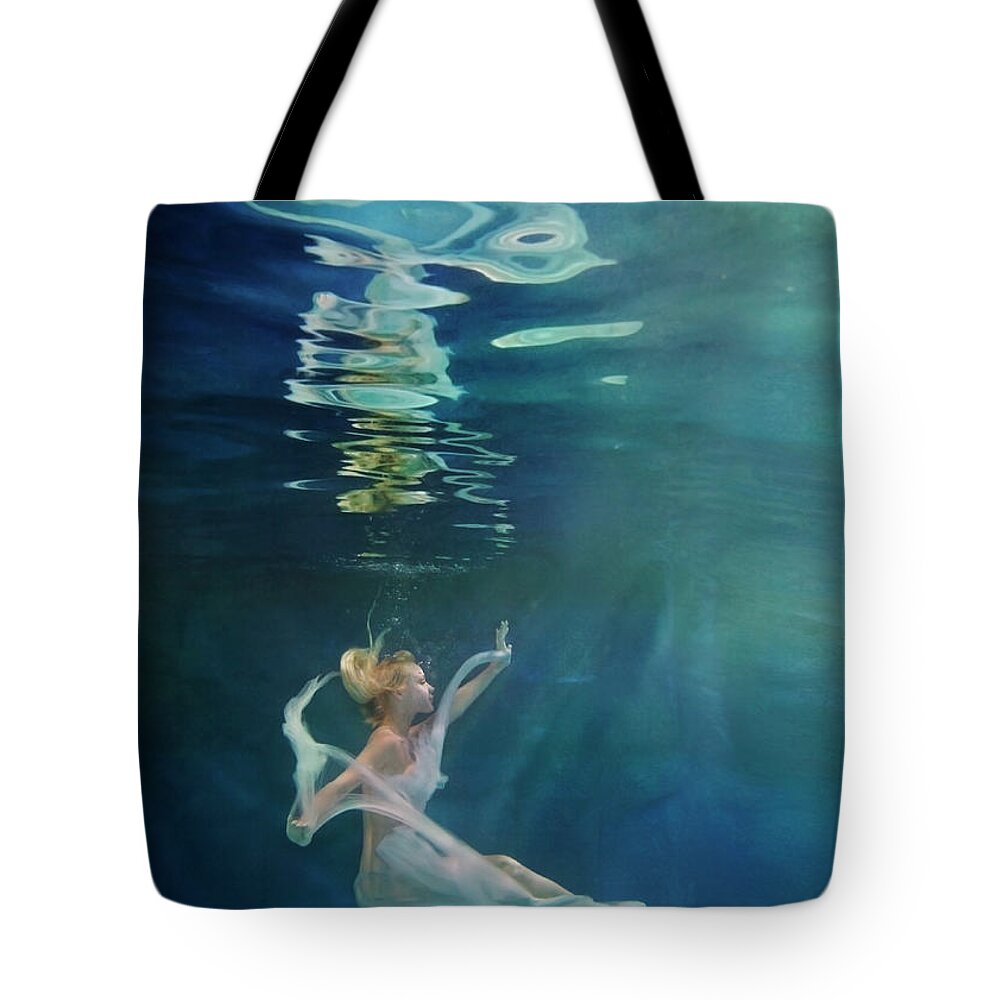 Tranquility Tote Bag featuring the photograph Caucasian Woman In Dress Swimming Under #5 by Ming H2 Wu