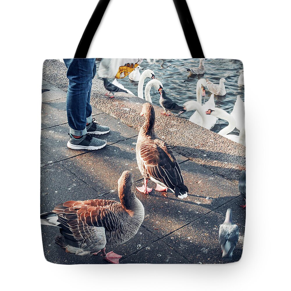 Alster Tote Bag featuring the photograph A bird market by Marina Usmanskaya
