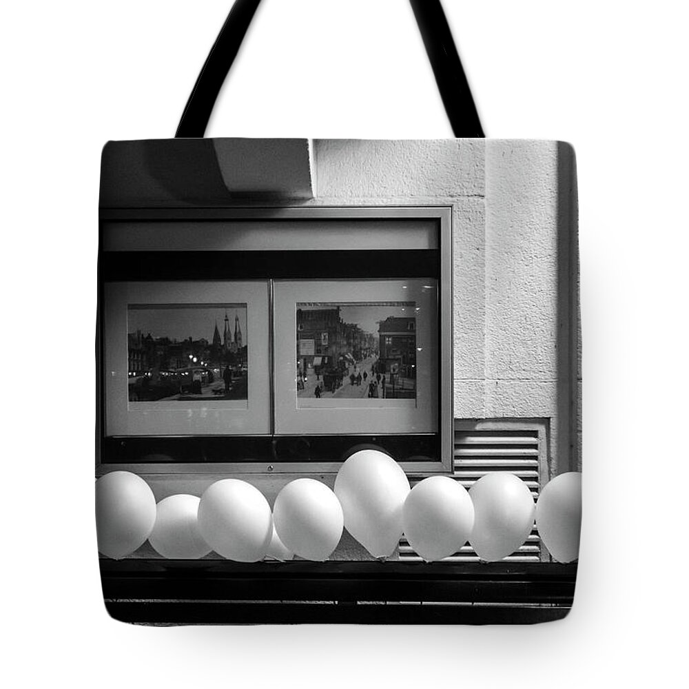 Urban Scenes Tote Bag featuring the photograph A Dozen White Balloons at 107 by Mary Lee Dereske