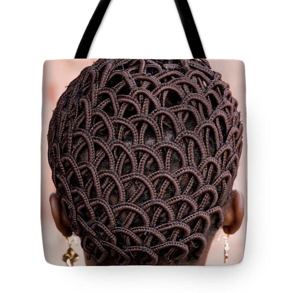 People Tote Bag featuring the photograph A Womans Head With Braided Patterned by Mint Images - Art Wolfe