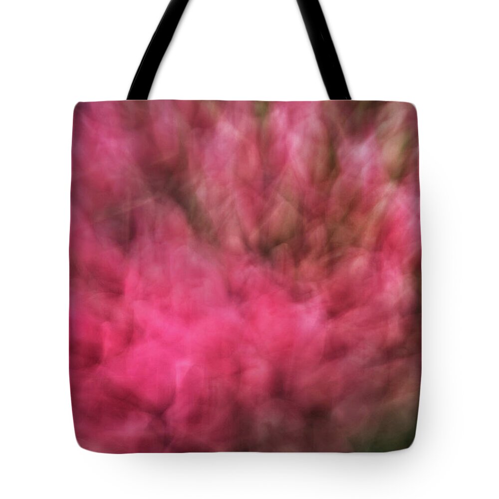 Abstract Tote Bag featuring the photograph Abstract blurred floral like background of pinks and greens by Teri Virbickis
