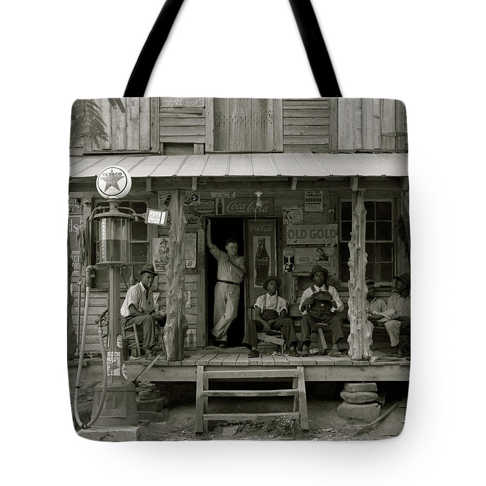 African Tote Bag featuring the painting African American and a white store owner on the Porch of a country store by 