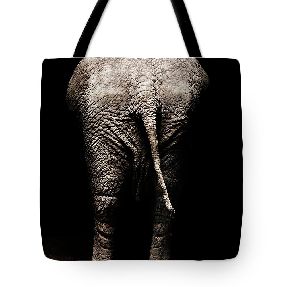 Animal Skin Tote Bag featuring the photograph African Elephant - Rear View by Henrik Sorensen