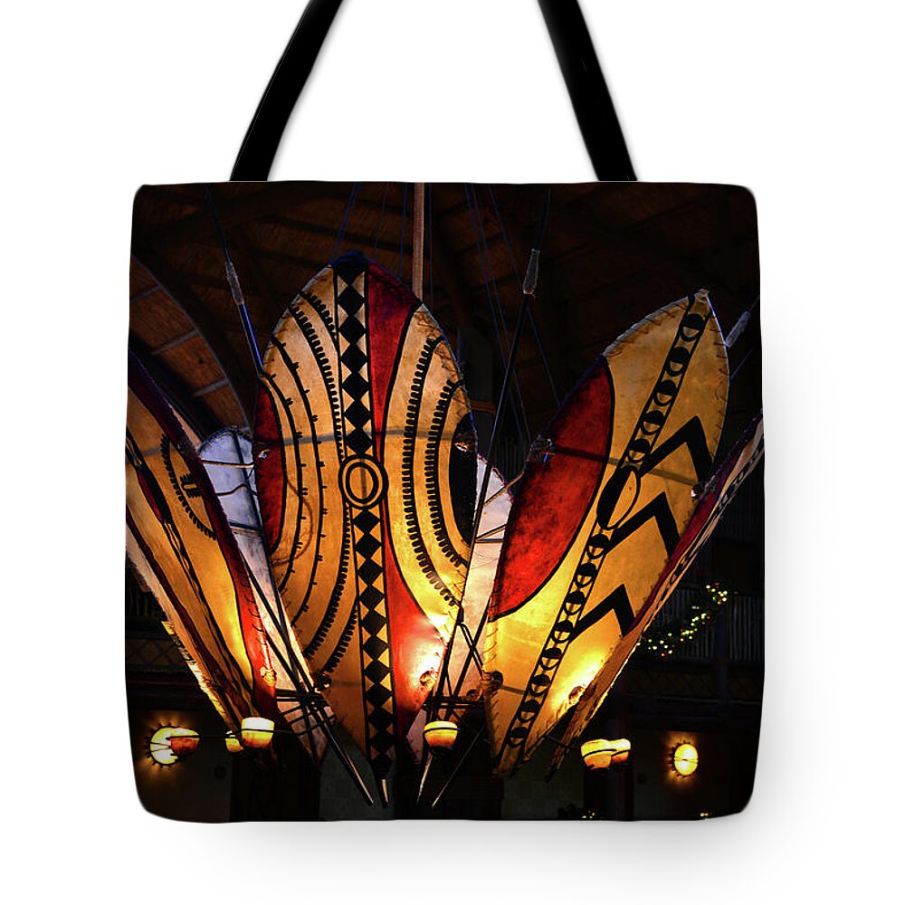 African Battle Shields Tote Bag featuring the photograph African shields at AK Lodge by David Lee Thompson