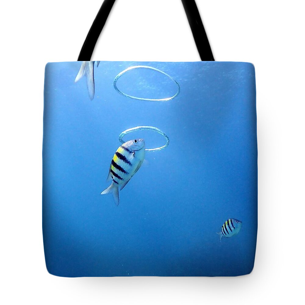 Air Rings Tote Bag featuring the photograph Air Rings by Farol Tomson