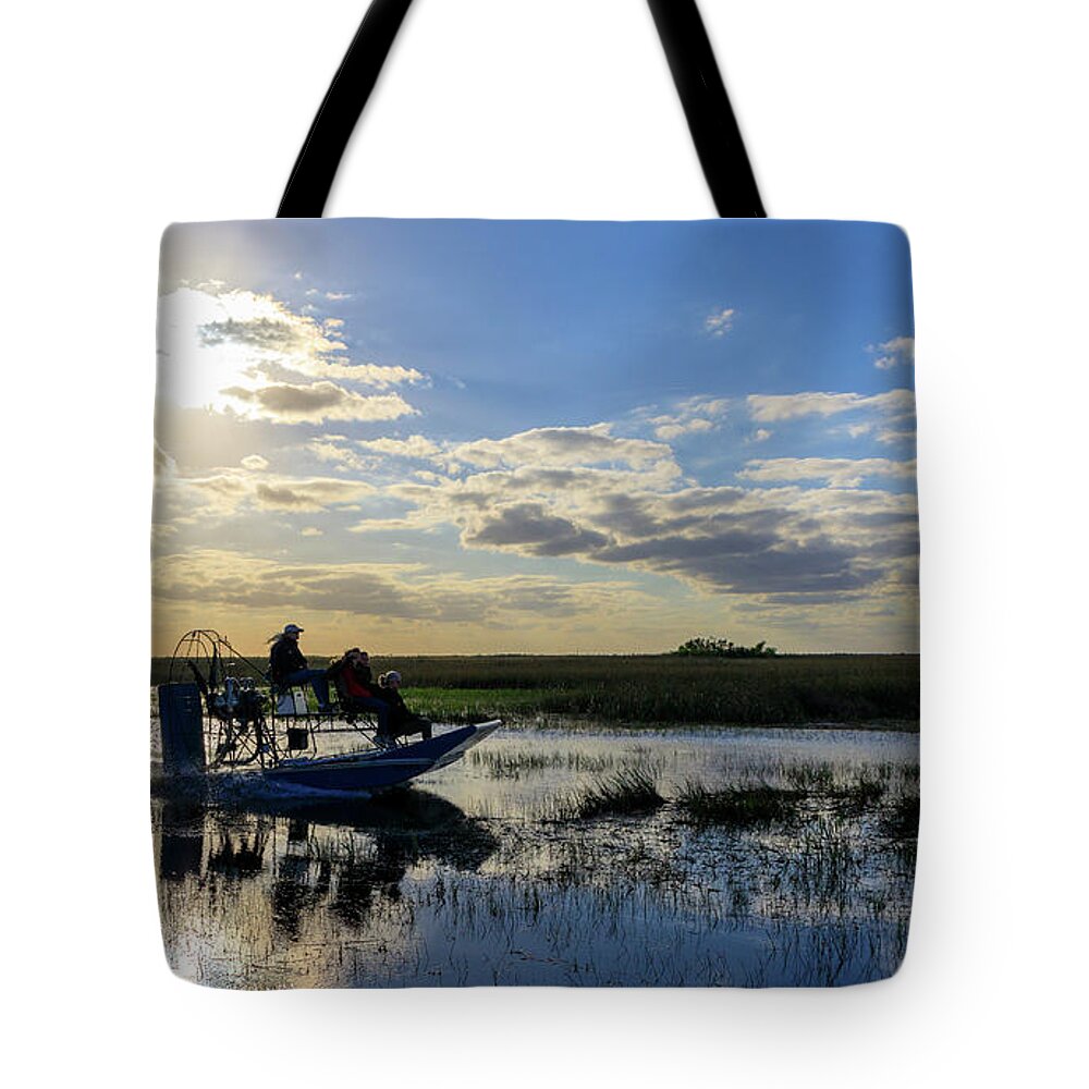 Airboat Tote Bag featuring the photograph Airboat at Sunset #660 by Michael Fryd