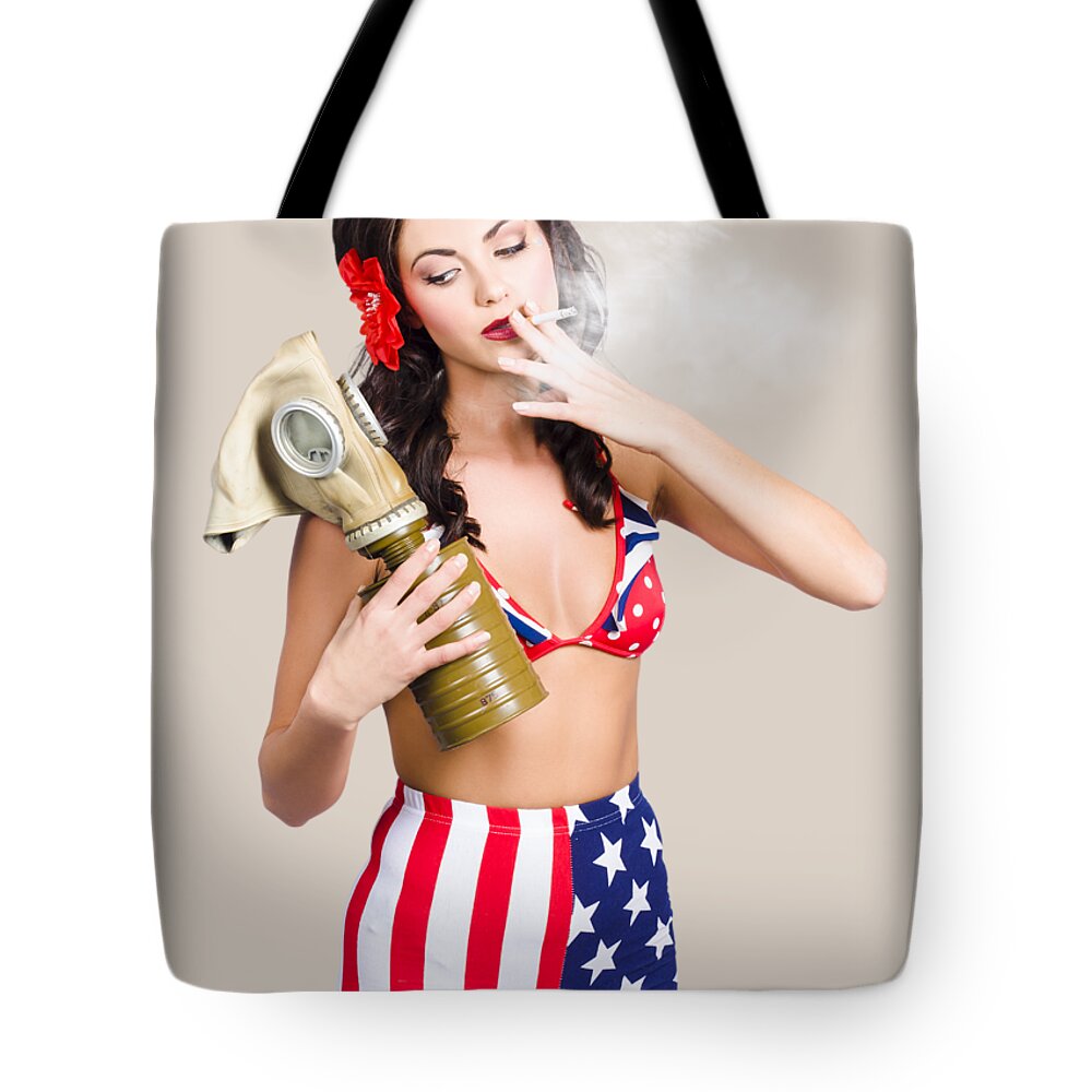 Soldier Tote Bag featuring the photograph American military pin up girl holding gasmask by Jorgo Photography