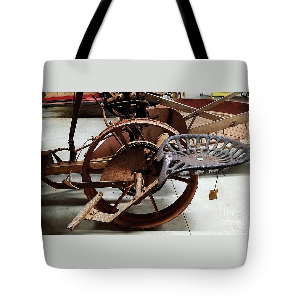 Tractor Seat Tote Bag featuring the photograph Antique Tractor Seat by Mary Capriole