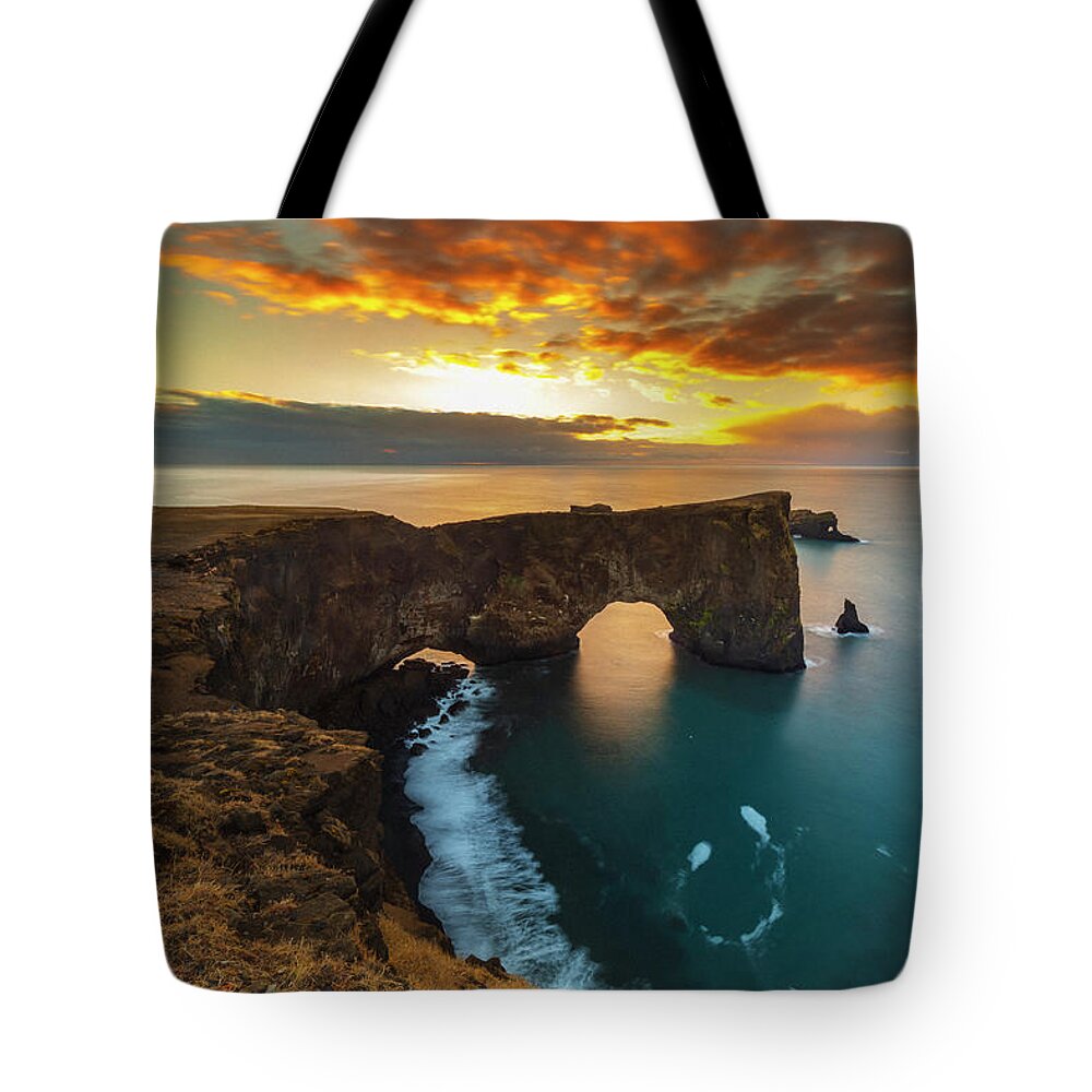 Estock Tote Bag featuring the digital art Arch Shaped Sea Stack, Iceland by Maurizio Rellini