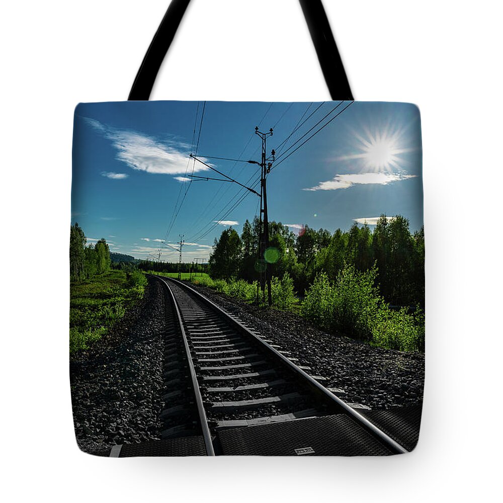 Sweden Tote Bag featuring the photograph Arctic Express by Dan Vidal
