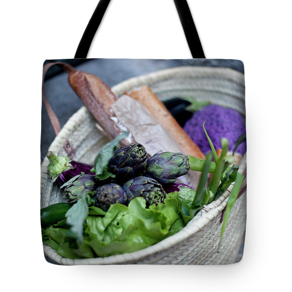 Ip_12499828 Tote Bag featuring the photograph Artichokes, Lettuce And Baguette In A Basket by Magdalena Bjrnsdotter