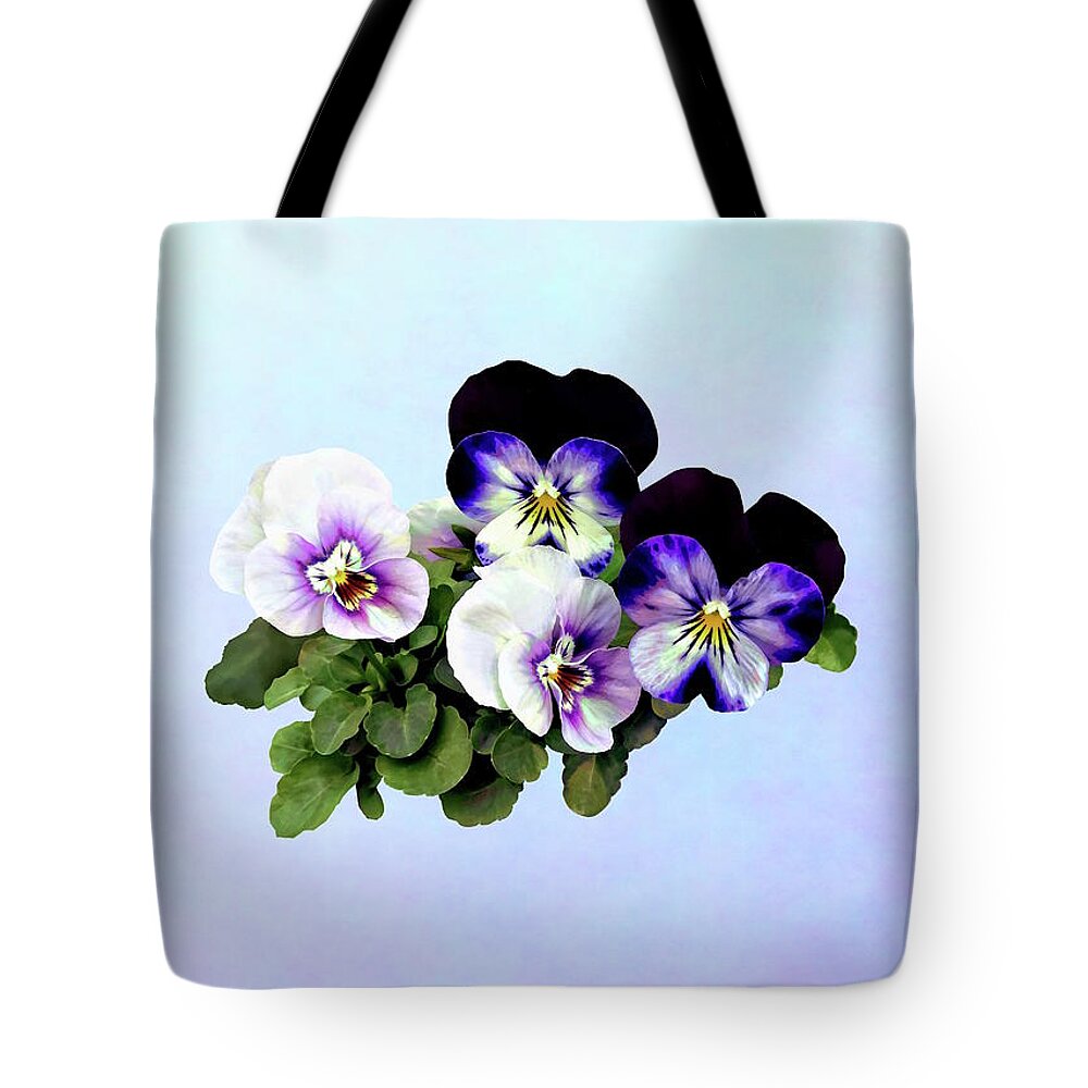 Pansy Tote Bag featuring the photograph Four Pansies by Susan Savad
