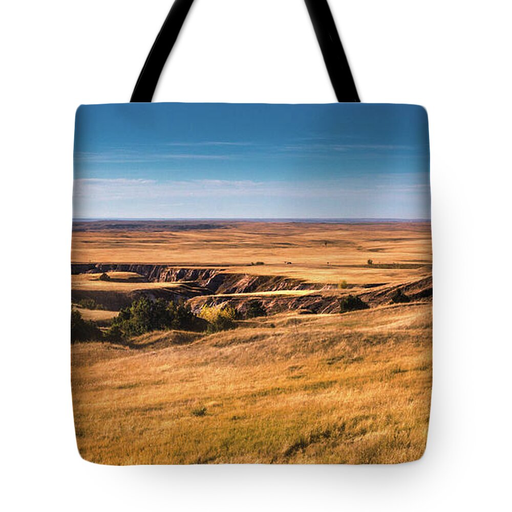 Badlands Tote Bag featuring the photograph Badlands by Tom Mc Nemar