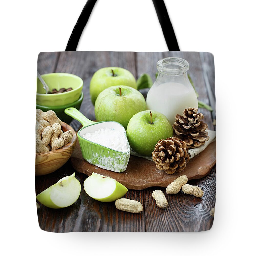 Milk Tote Bag featuring the photograph Baking With Apples And Peanuts by Julia Khusainova