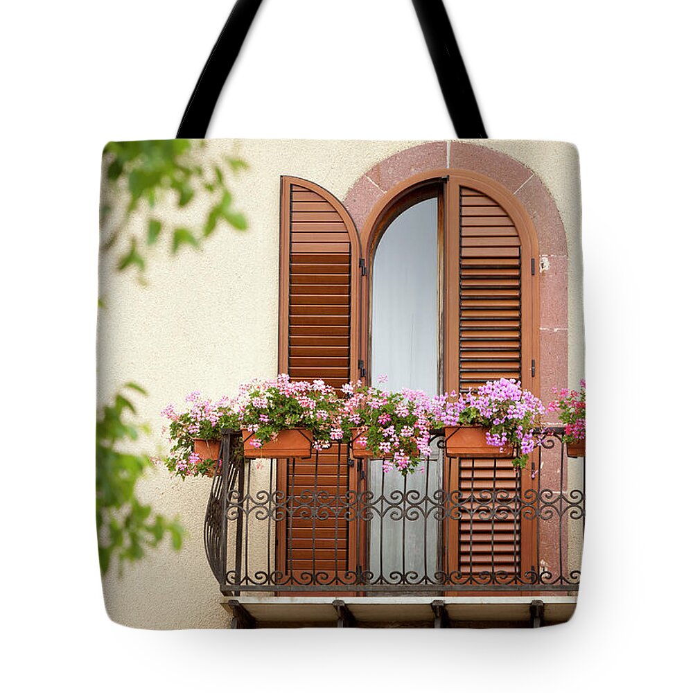 Architectural Feature Tote Bag featuring the photograph Balcony With Flowers by Visualcommunications