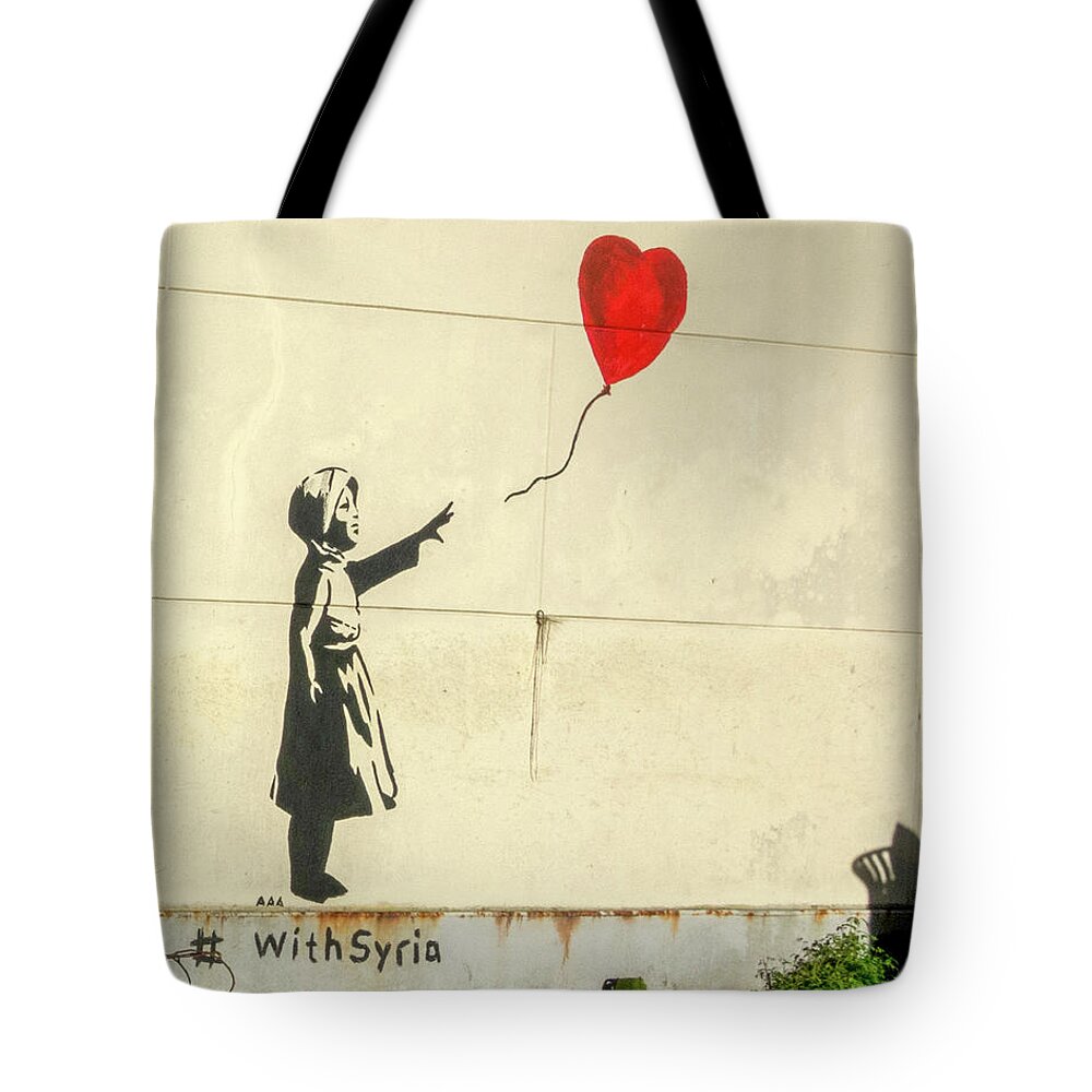 Amsterdam Tote Bag featuring the photograph Banksy Girl With Balloon With Syria by Gigi Ebert