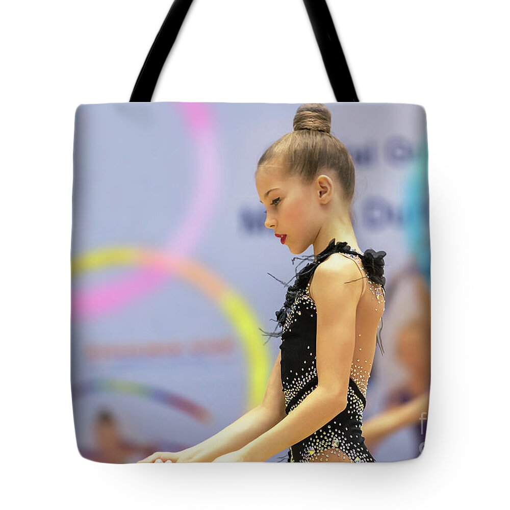Acrobat Tote Bag featuring the photograph Beautiful little gymnast by Anna Om