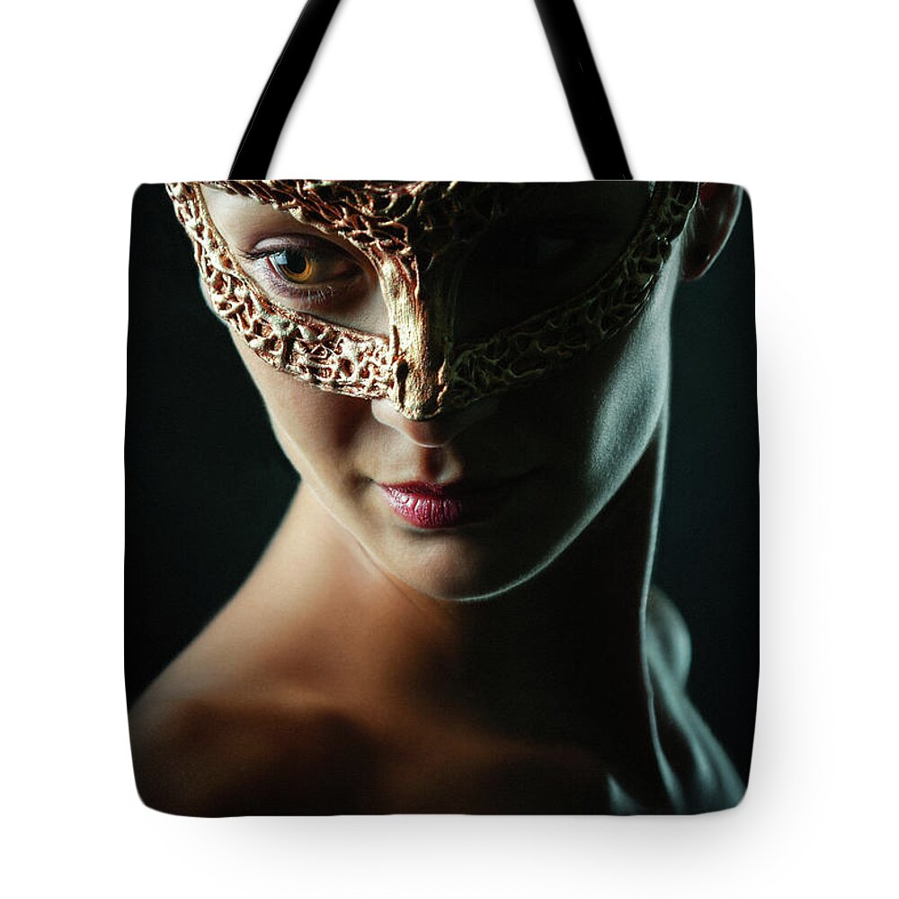Art Tote Bag featuring the photograph Beauty model woman wearing masquerade carnival mask by Dimitar Hristov