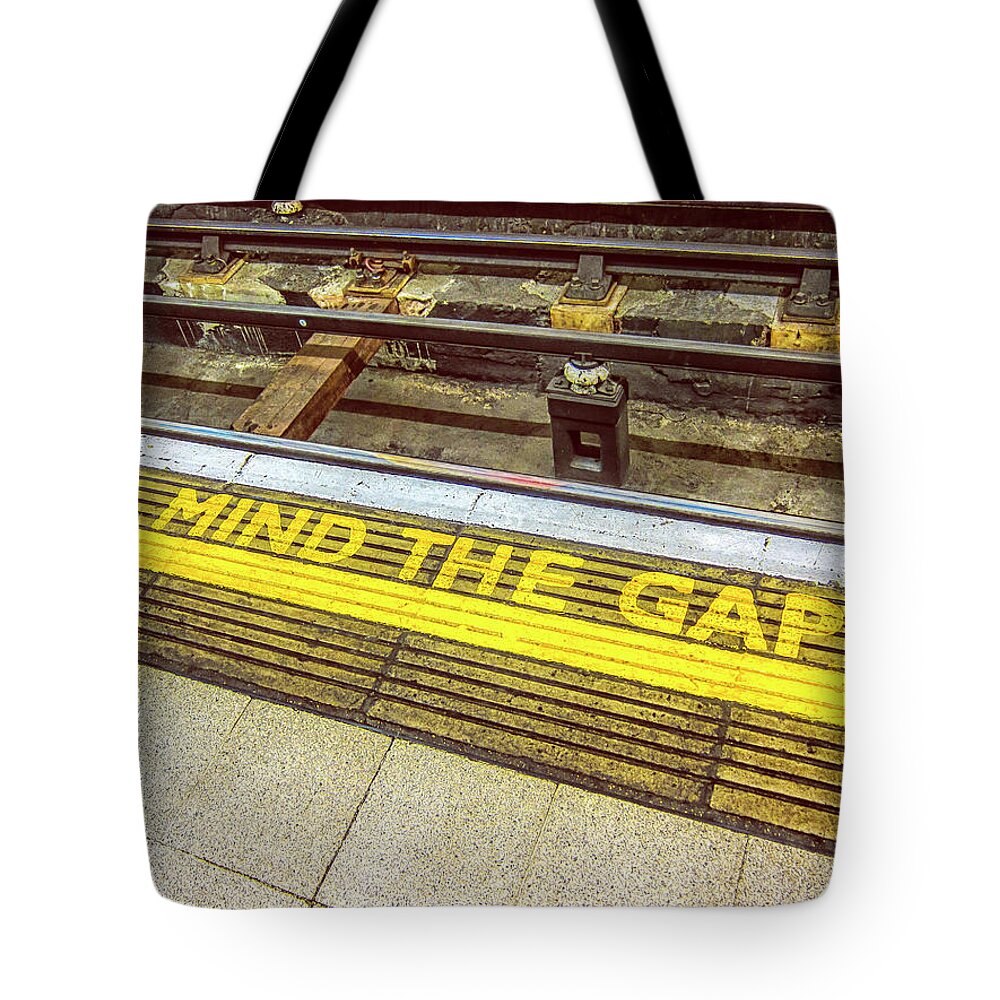 London Tote Bag featuring the photograph Better Mind The Gap by Joseph S Giacalone