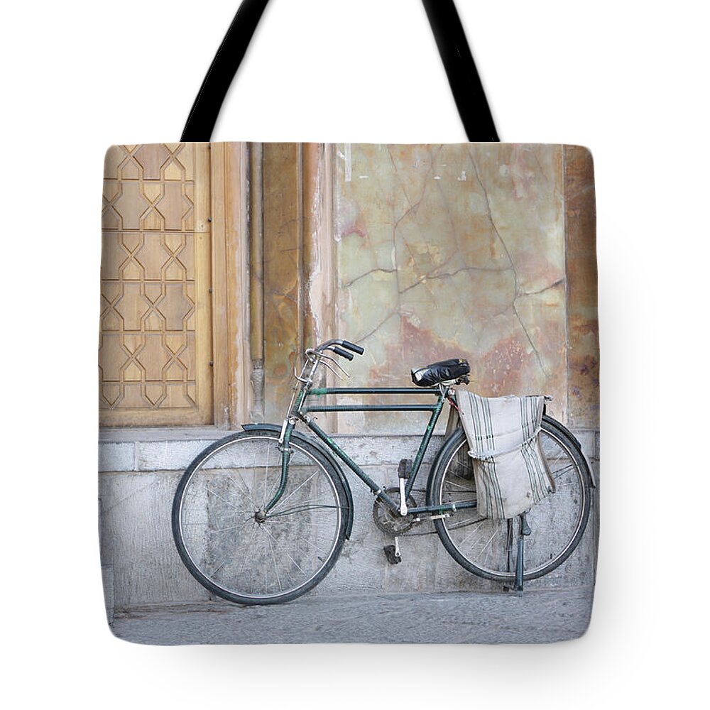Tranquility Tote Bag featuring the photograph Bicycle Outside The Imam Mosque by 717images By Paul Wood